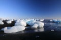 Glacier ice chunks on the black beach at Jokulsarlon, Iceland