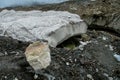 Glacier lake with icebergs and gray stones Royalty Free Stock Photo