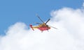 Yellow rescue helicopter near the Swiss Matterhorn