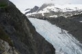 Glacier sliding down the side of a mountain