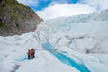 Glacier trekking conversation Royalty Free Stock Photo