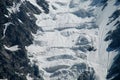 Glacier wall ice blocks falling