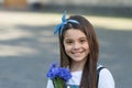 glad girl with spring flowers on mothers day