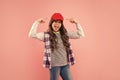 glad kid with curly hair in cap. teen hipster beauty hairstyle. female casual fashion model. Royalty Free Stock Photo