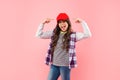 glad kid with curly hair in cap. teen hipster beauty hairstyle. female casual fashion model. Royalty Free Stock Photo