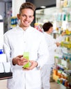 Glad man druggist in white coat