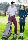 Man and woman golf partners ready to enjoy game