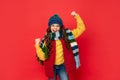 glad successful kid with curly hair in hat. female fashion model. teen girl in scarf.