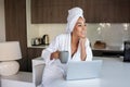 Glad woman drinking coffee at home Royalty Free Stock Photo