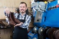 Glad worker displaying result of his work Royalty Free Stock Photo