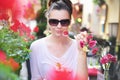 Glad young woman eating a dessert