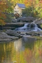 Glade Creek Grist Mil and autumn reflections and water fall in Babcock State Park, WV Royalty Free Stock Photo