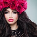 Glamorous Brunette Woman with Curly Hair and Roses Wreath Royalty Free Stock Photo