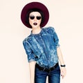 Glamorous fashion lady in a stylish jeans clothes Royalty Free Stock Photo