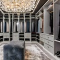 Glamorous Hollywood Walk-In Closet: A luxurious walk-in closet with floor-to-ceiling mirrors, sparkling chandeliers, and custom