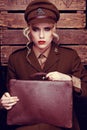 Glamorous intense young female army recruit