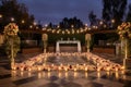 glamorous outdoor dance floor with string lights, candles, and rose petals