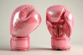 Glamorous Pink boxing gloves on a light background. Concept of femininity in sports, fashionable athletic equipment, and