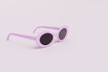 glamorous sunglasses with a pink frame on a white background. copy paste, copy space. 3D render