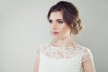 Glamorous woman with perfect makeup and bridal hair on white background, female face closeup Royalty Free Stock Photo