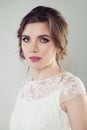 Glamorous woman portrait. Beautiful bride with makeup and bridal hairstyle, female face closeup Royalty Free Stock Photo