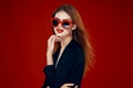 glamorous woman wearing sunglasses red lips posing close-up Royalty Free Stock Photo