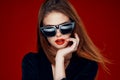 glamorous woman wearing sunglasses red lips posing close-up Royalty Free Stock Photo