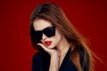 glamorous woman wearing sunglasses red lips posing close-up Royalty Free Stock Photo