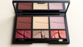 Glamour collection eyeshadow palette, lipstick set, mascara variation generated by AI