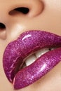 Glamour magenta gloss lip make-up. Fashion makeup beauty shot. Close-up female full lips with celebrate pink gloss