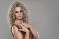 Glamour model with curly blond hair Royalty Free Stock Photo