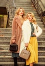 glamour models look luxuriously. sexy blong women. autumn season. modern life. european winter. girls warm coat on Royalty Free Stock Photo