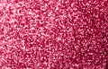 Glamour sparkling background toned in electric magenta color.