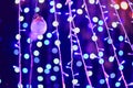 Glamour Ultra Violet sparkling and purple glitter bokeh. Multicolored Christmas and New Year glowing light abstract bokeh and Royalty Free Stock Photo