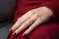 Glamour woman hand with classic red nail polish on her fingernails. Red nail manicure with gel polish at luxury beauty salon. Nail