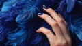 Glamour woman hand with luxury navy color nail polish manicure on fingers