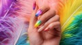 Glamour woman hand with luxury rainbow color nail polish manicure on fingers