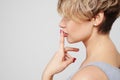 Glamour woman holding finger near lips Royalty Free Stock Photo
