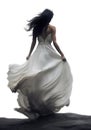 glamour woman running off a stone cliff. holding her dress. transparent PNG