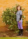 Adele amongst the camelias.Upright.