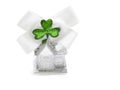 Glamourous home with glitter and white bow with green shamrock on white background. Buying high value house property in Ireland.