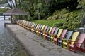 High angle view of the multi-coloured Muskoka Chairs in the tourist resort with the patio gazebo Royalty Free Stock Photo