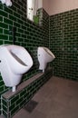 Glance into an extraordinary guest toilet. with two urinal