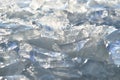 Glare of light reflected in the shards of pure ice