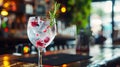 a Glas with gin and wildberry on a table in a bar Royalty Free Stock Photo