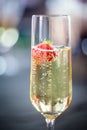 Glas of sparkling wine or champagne and strawberry