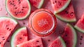 a glas of watermelon juice surrounded by slices of watermelon Royalty Free Stock Photo