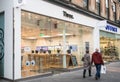 Exterior of Three Mobile Phone shop showing logo, signage and branding