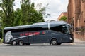 Grey Scania Irizar i6 coach of the A.C. Williams company in Glasgow at High and Castle Street with a slight motion blut effect Royalty Free Stock Photo