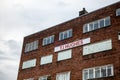 The historical building of T.J. Hughes department store which sells furniture , garden equipment and other stuff in Glasgow